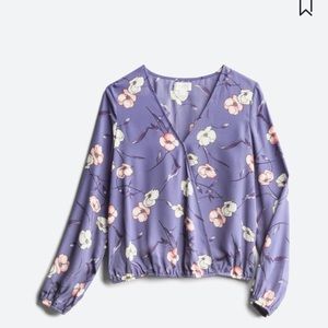 Worn one time. Beautiful purple floral blouse